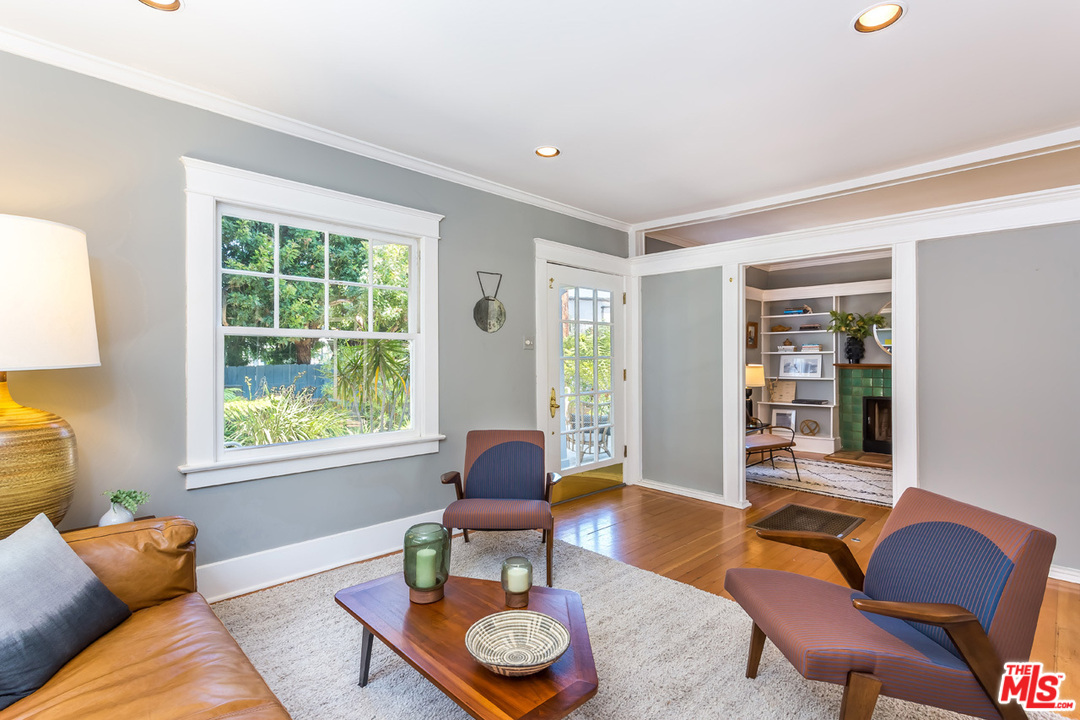754 Marco Place Venice, CA 90291 - Photo 4 of 39 a living room with furniture and a window