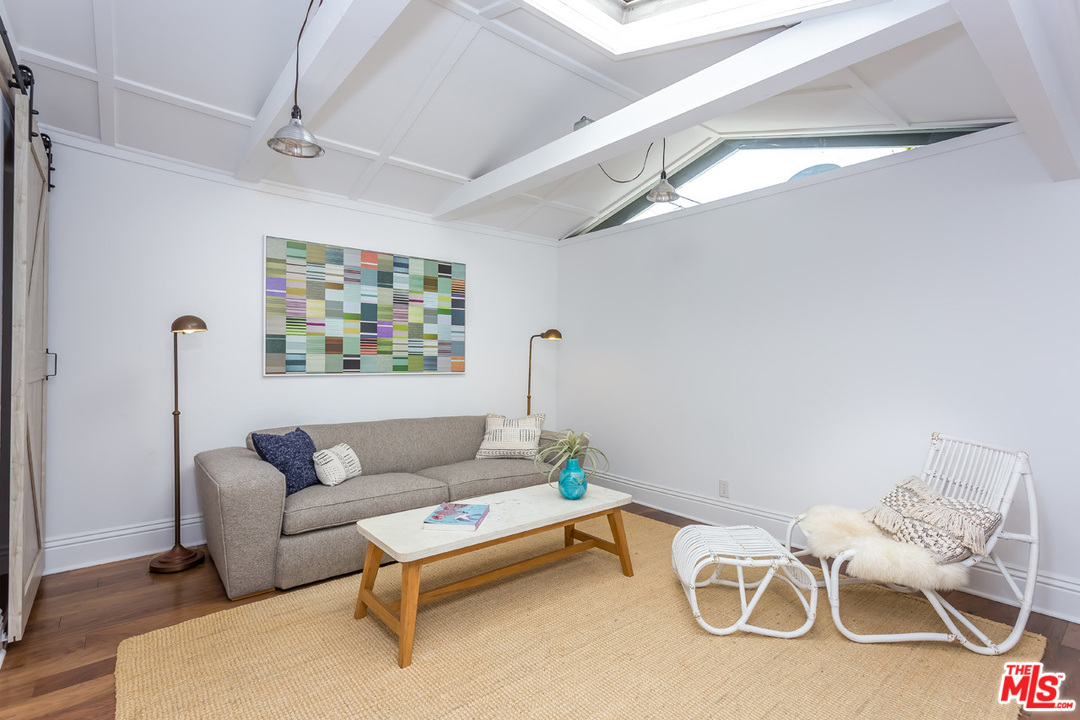 754 Marco Place Venice, CA 90291 - Photo 34 of 39 a living room with furniture and a table