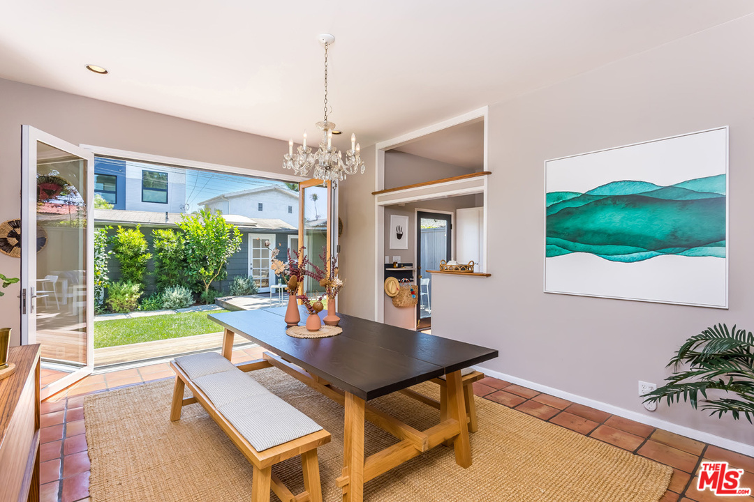 754 Marco Place Venice, CA 90291 - Photo 7 of 39 a view of a dining room with furniture window and wooden floor