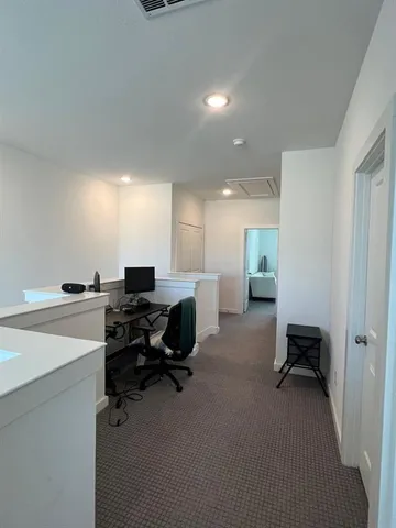 a view of a workspace with a window