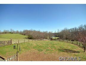 206 Burt Blackwell Road Mill Spring, NC 28756 - Photo 14 of 16 a view of an ocean from a balcony