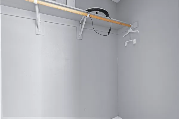 a view of a room with racks on the wall