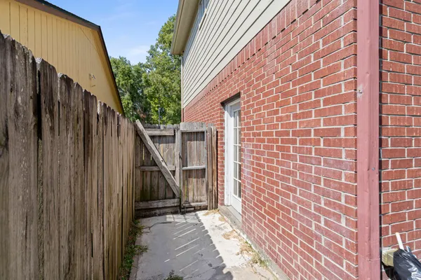 a view of a house with stairs and wooden floor