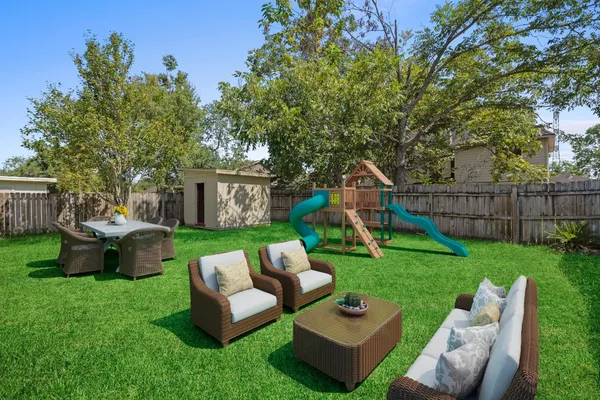 a view of a couches in a backyard