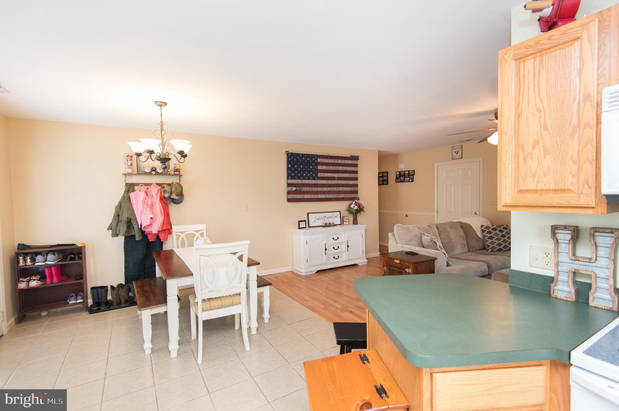 6568 Statum Road Preston, MD 21655 - Photo 11 of 49 a dining room with furniture and window