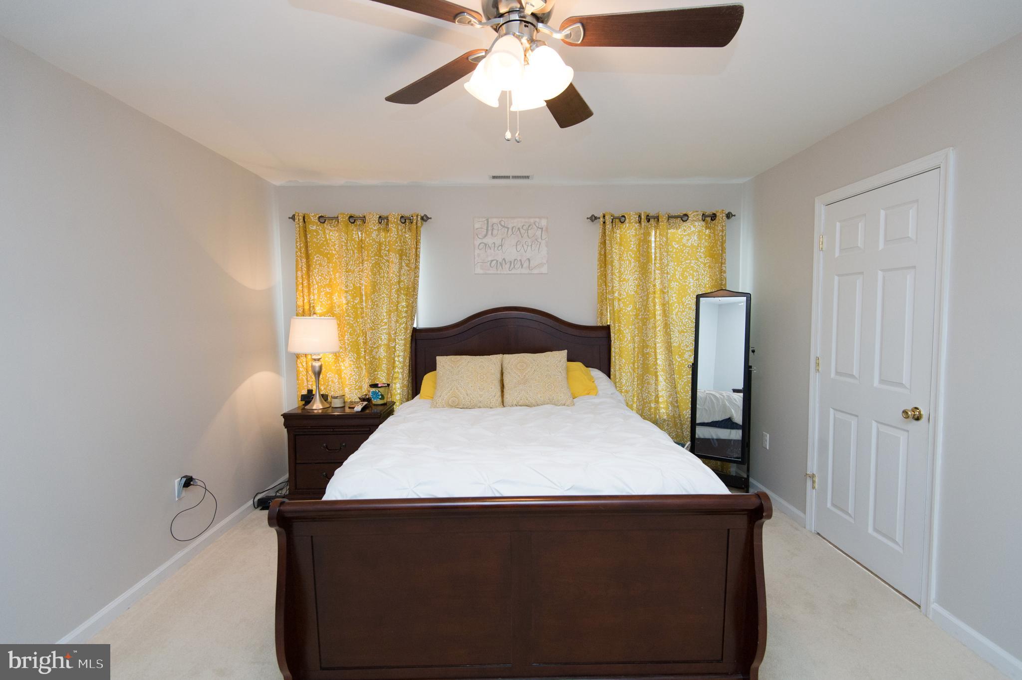 6568 Statum Road Preston, MD 21655 - Photo 15 of 49 a bedroom with a bed and window