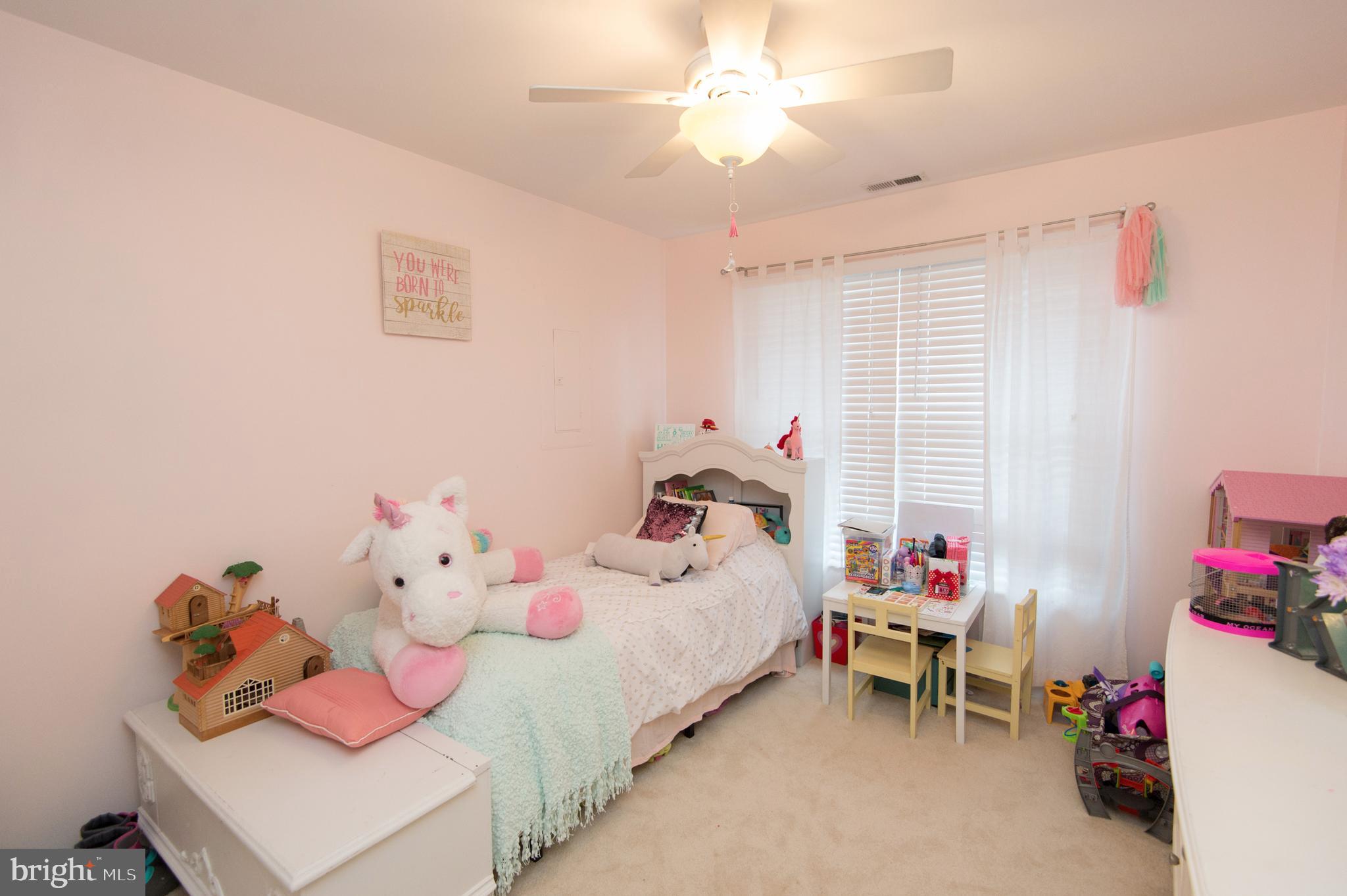 6568 Statum Road Preston, MD 21655 - Photo 21 of 49 a bedroom with a bed and a window
