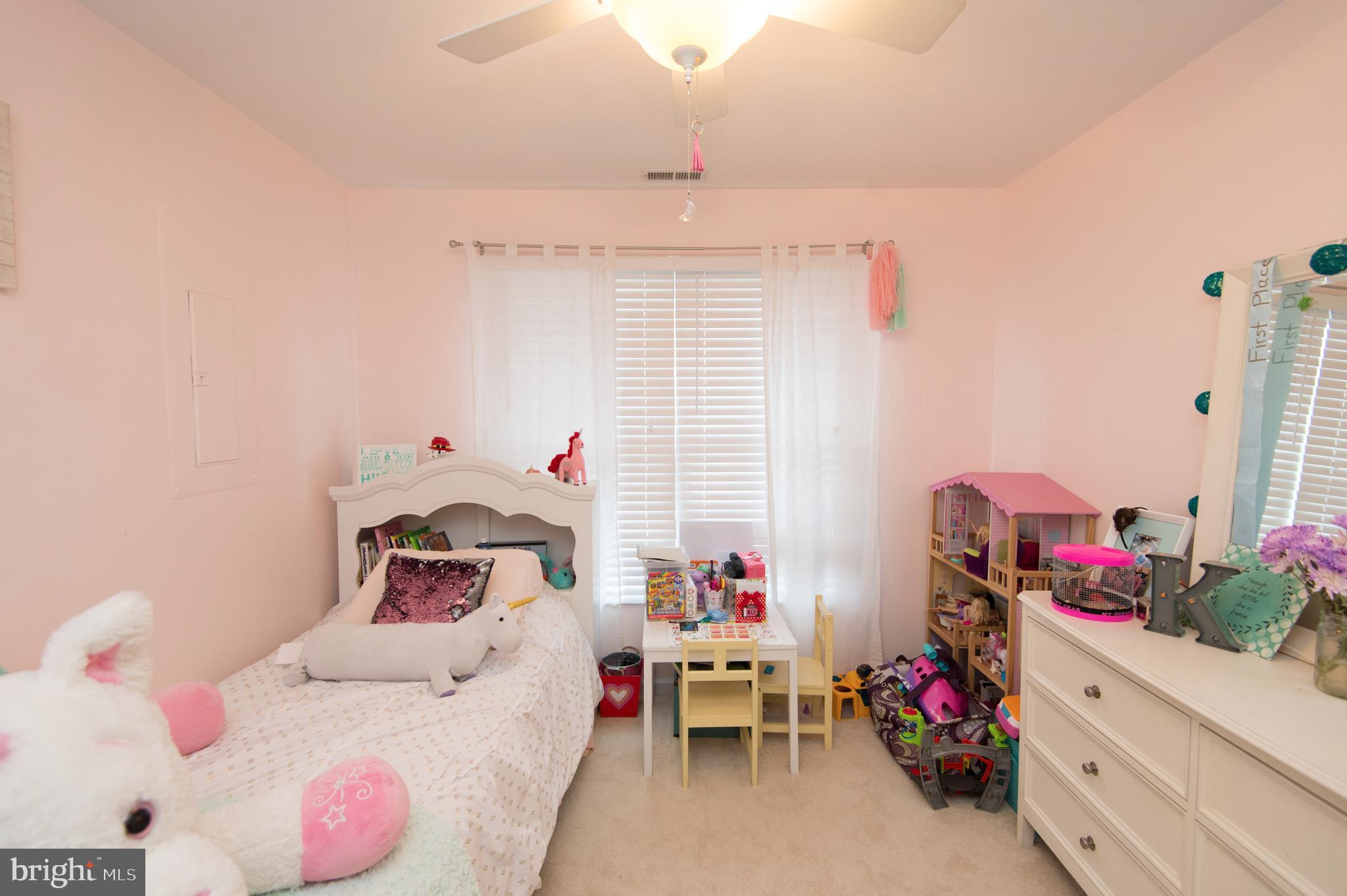 6568 Statum Road Preston, MD 21655 - Photo 22 of 49 a bedroom with a bed and a window