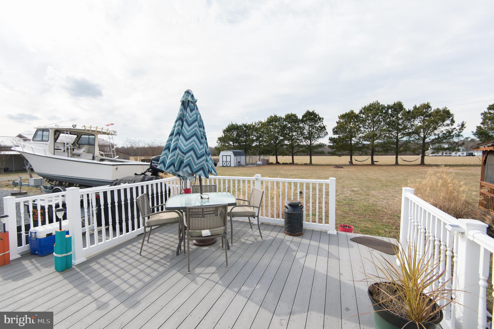 6568 Statum Road Preston, MD 21655 - Photo 28 of 49 a view of roof deck with patio