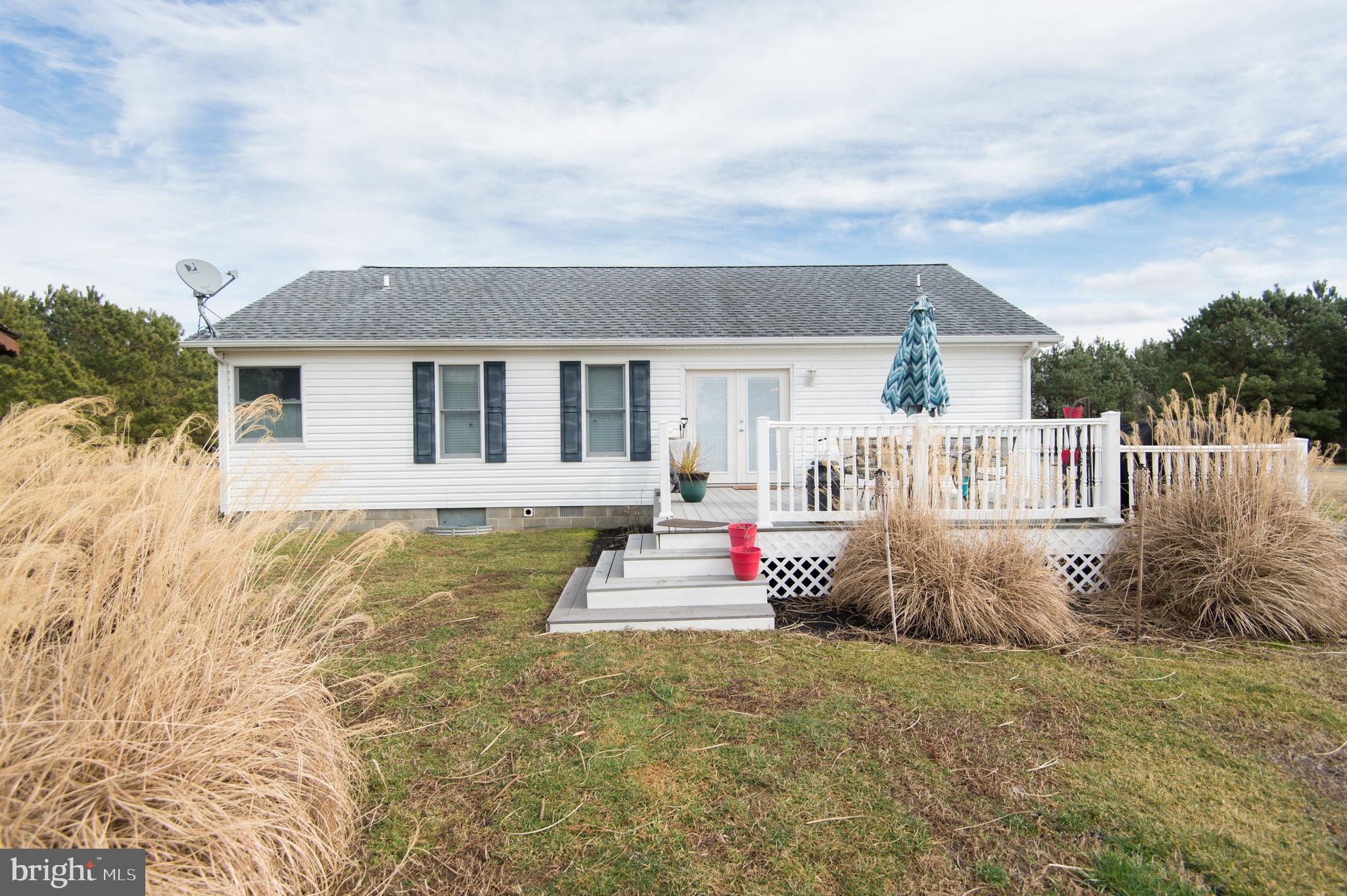 6568 Statum Road Preston, MD 21655 - Photo 33 of 49 a front view of a house with a yard