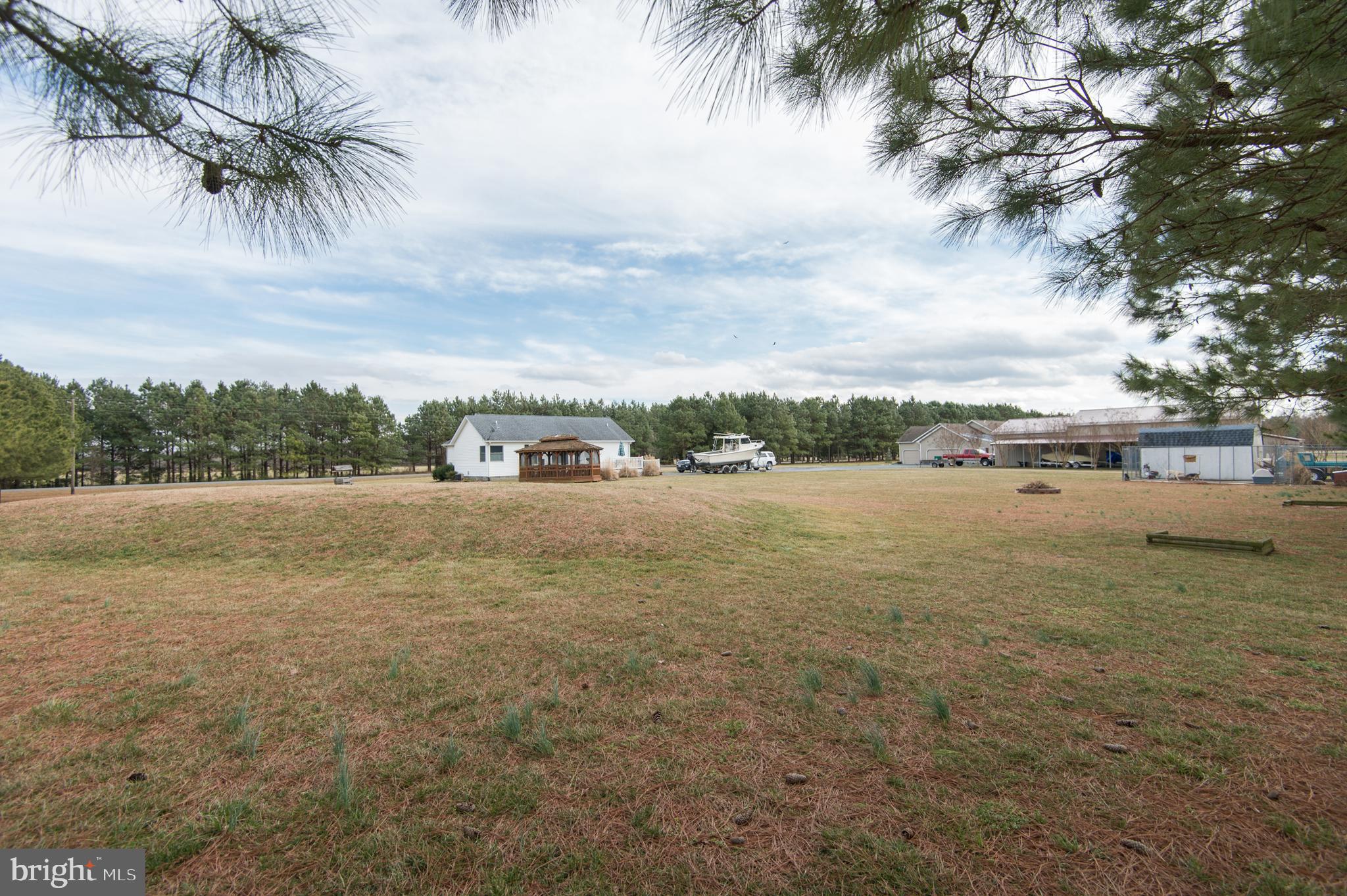 6568 Statum Road Preston, MD 21655 - Photo 38 of 49 a view of a lake with houses in the background