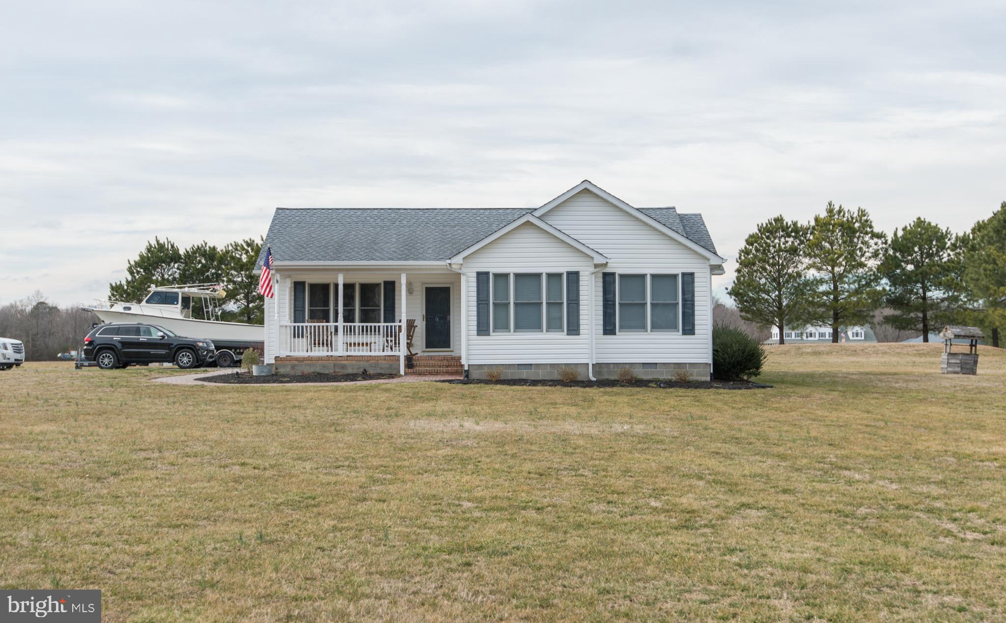 6568 Statum Road Preston, MD 21655 - Photo 43 of 49 a front view of a house with a garden