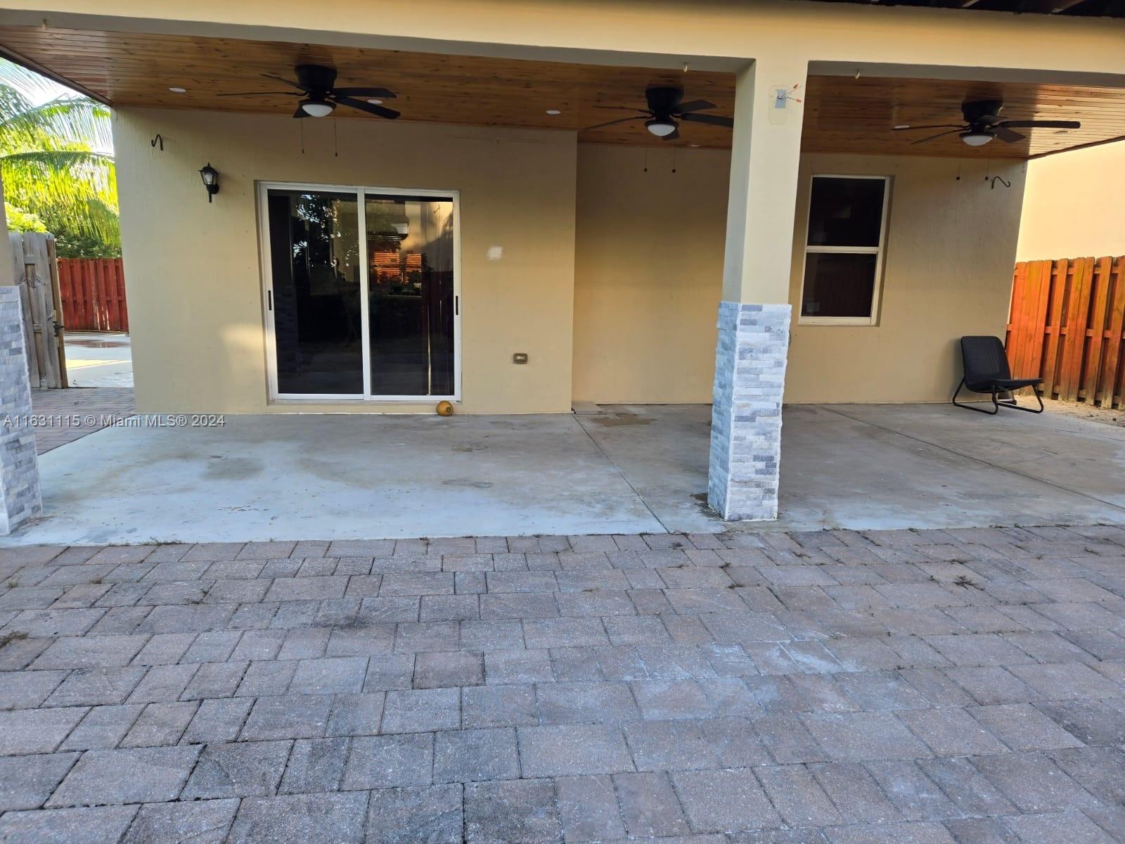 28407 Southwest 129th Place Homestead, FL 33033 - Photo 15 of 17 a view of a house with a street