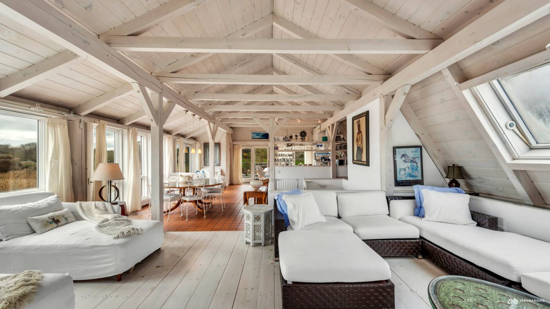 1100 Ocean Road Bridgehampton, NY 11932 - Photo 11 of 49 a living room with furniture and a large window