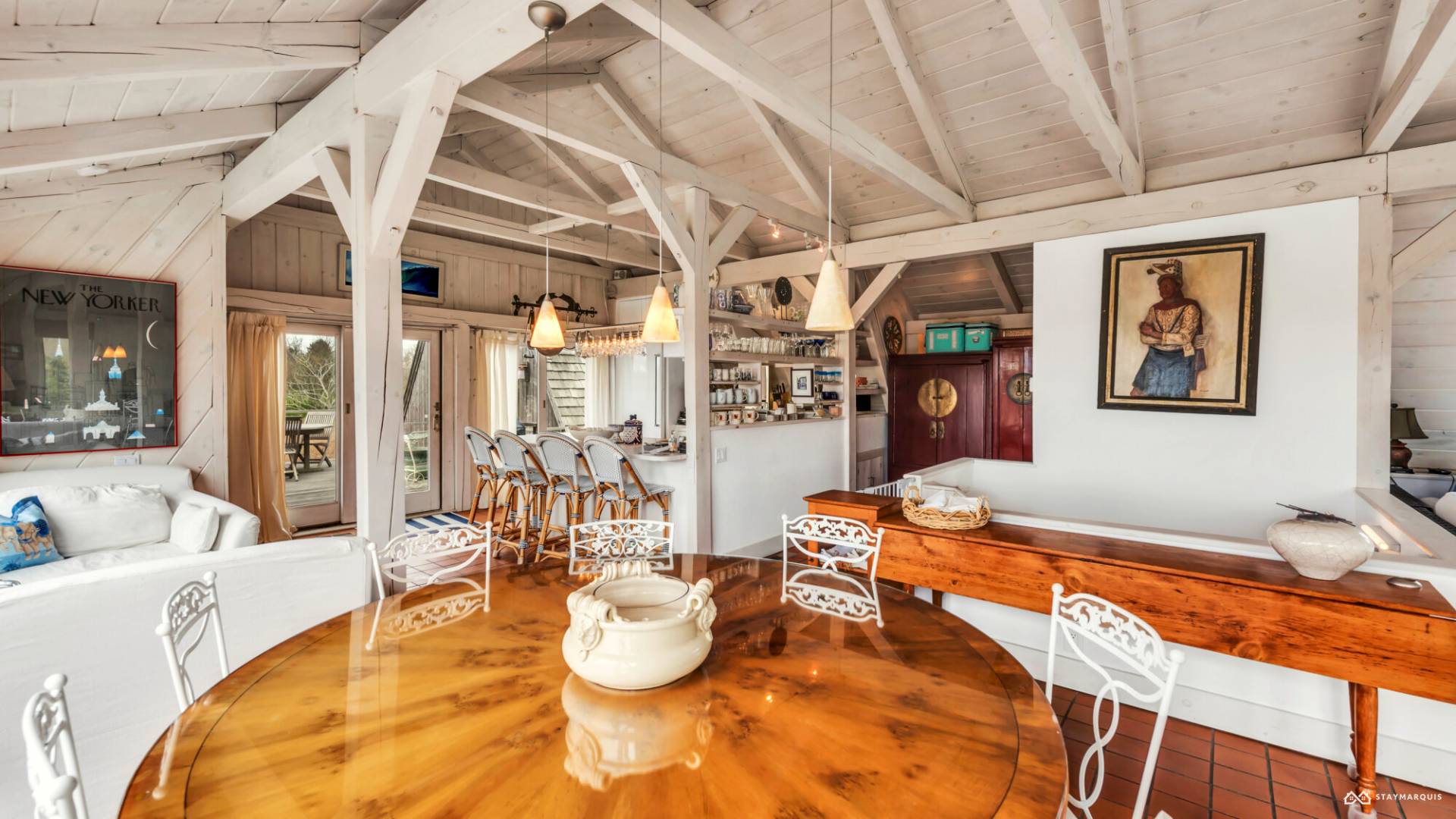 1100 Ocean Road Bridgehampton, NY 11932 - Photo 14 of 49 a view of a dining room with furniture