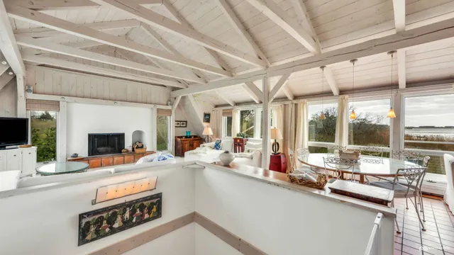 a very nice looking living room with a large window