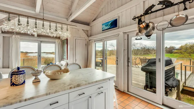 a kitchen with sink and window