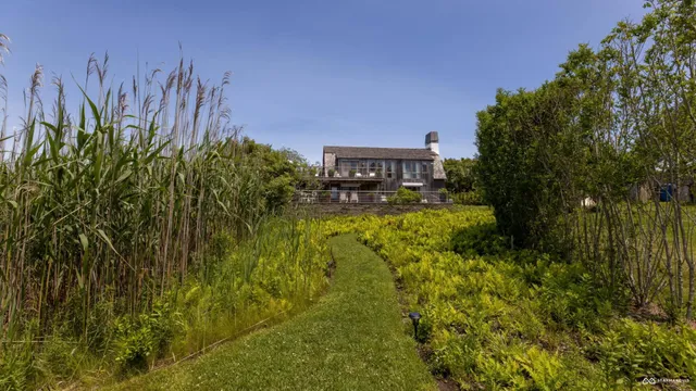 a view of sitting area with furniture on wooden deck