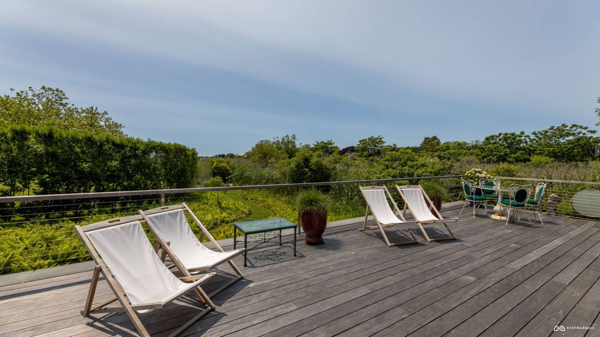 1100 Ocean Road Bridgehampton, NY 11932 - Photo 41 of 49 a view of sitting area with furniture on wooden deck