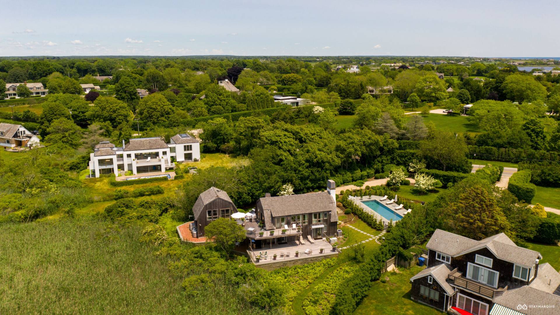 1100 Ocean Road Bridgehampton, NY 11932 - Photo 46 of 49 an aerial view of a house with a yard