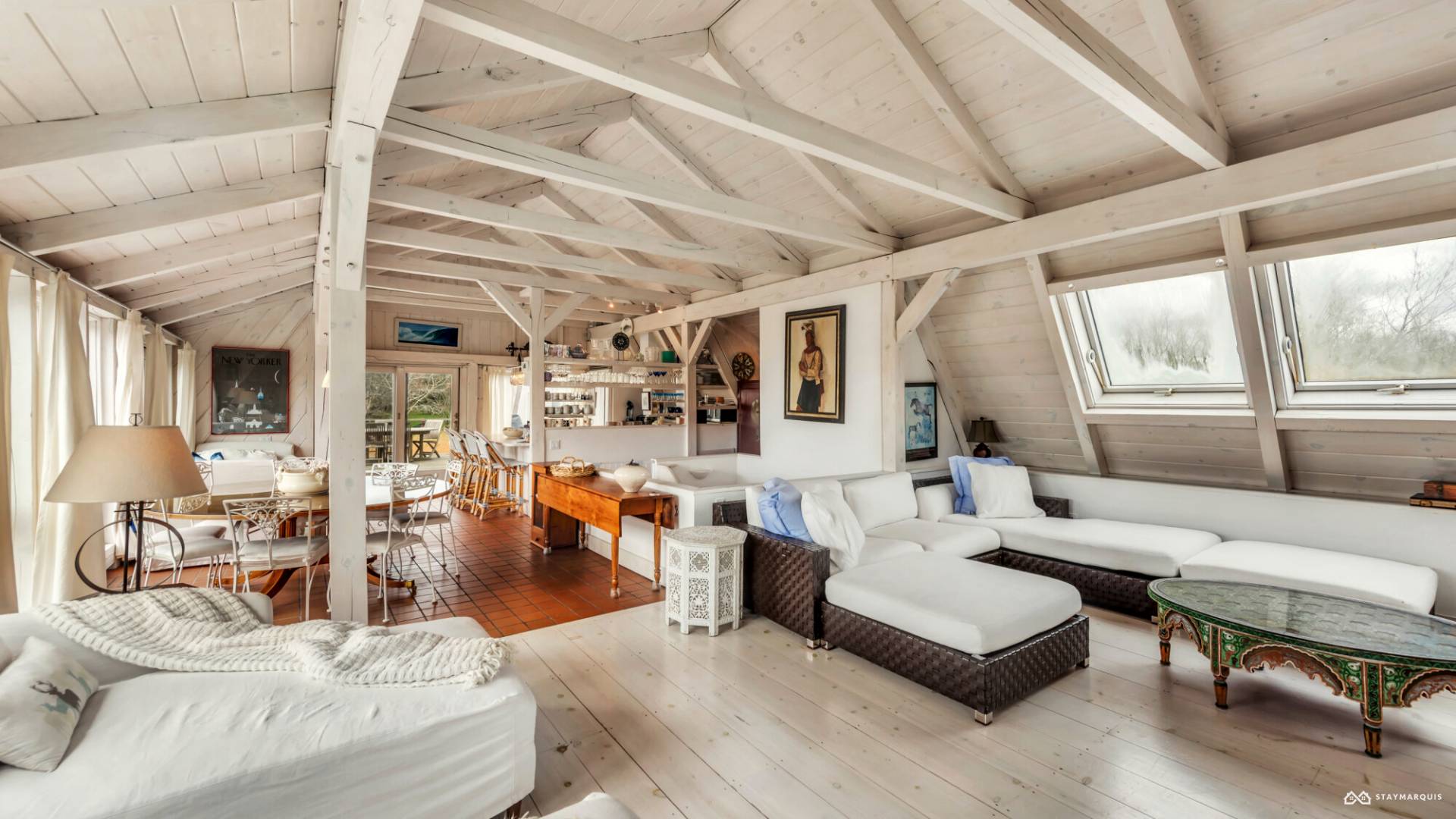 1100 Ocean Road Bridgehampton, NY 11932 - Photo 9 of 49 a living room with furniture and a large window