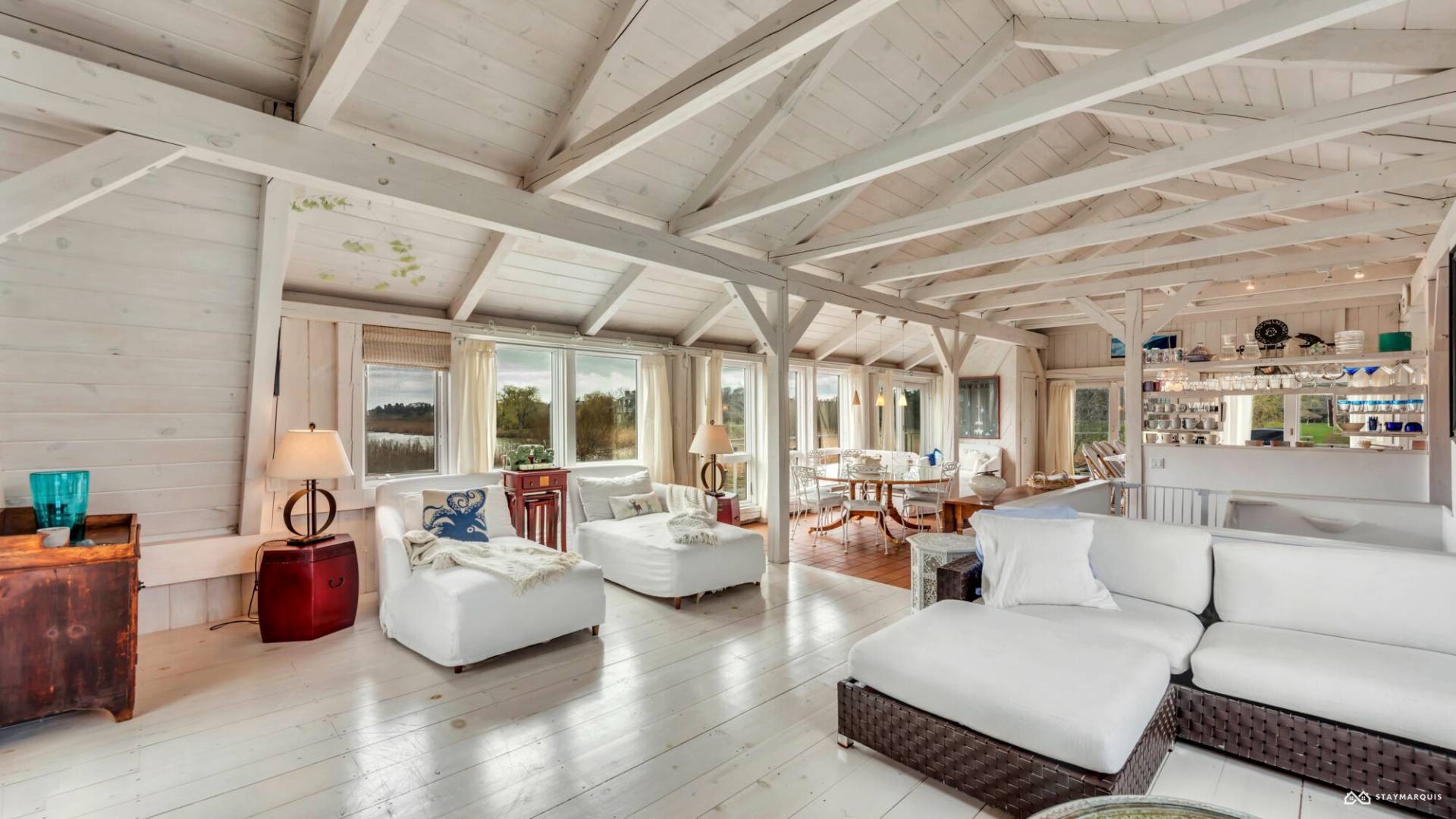 1100 Ocean Road Bridgehampton, NY 11932 - Photo 10 of 49 a living room with furniture and a large window