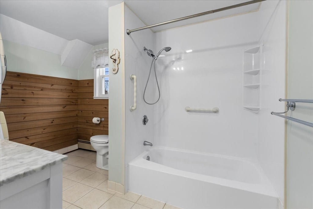 32 Barker Road, Unit 3 Scituate, MA 02066 - Photo 14 of 23 a bathroom with a granite countertop sink toilet and shower