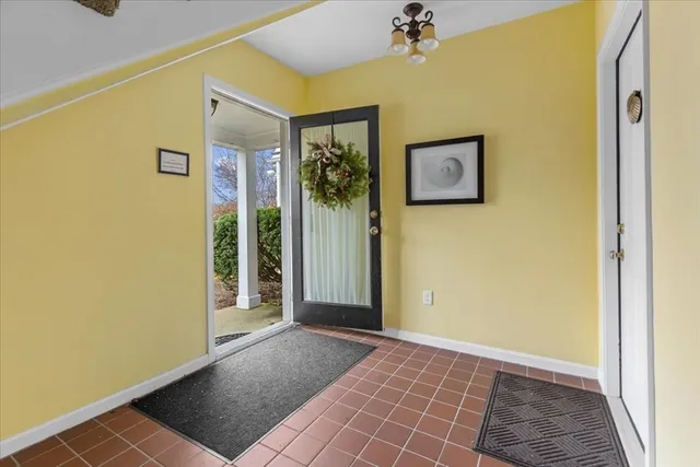a view of a hallway with staircase