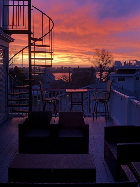 32 Barker Road, Unit 3 Scituate, MA 02066 - Photo 23 of 23 a view of a chairs and table on the terrace