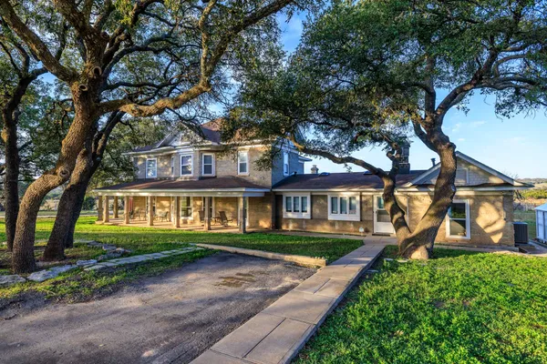 front view of a house with a yard