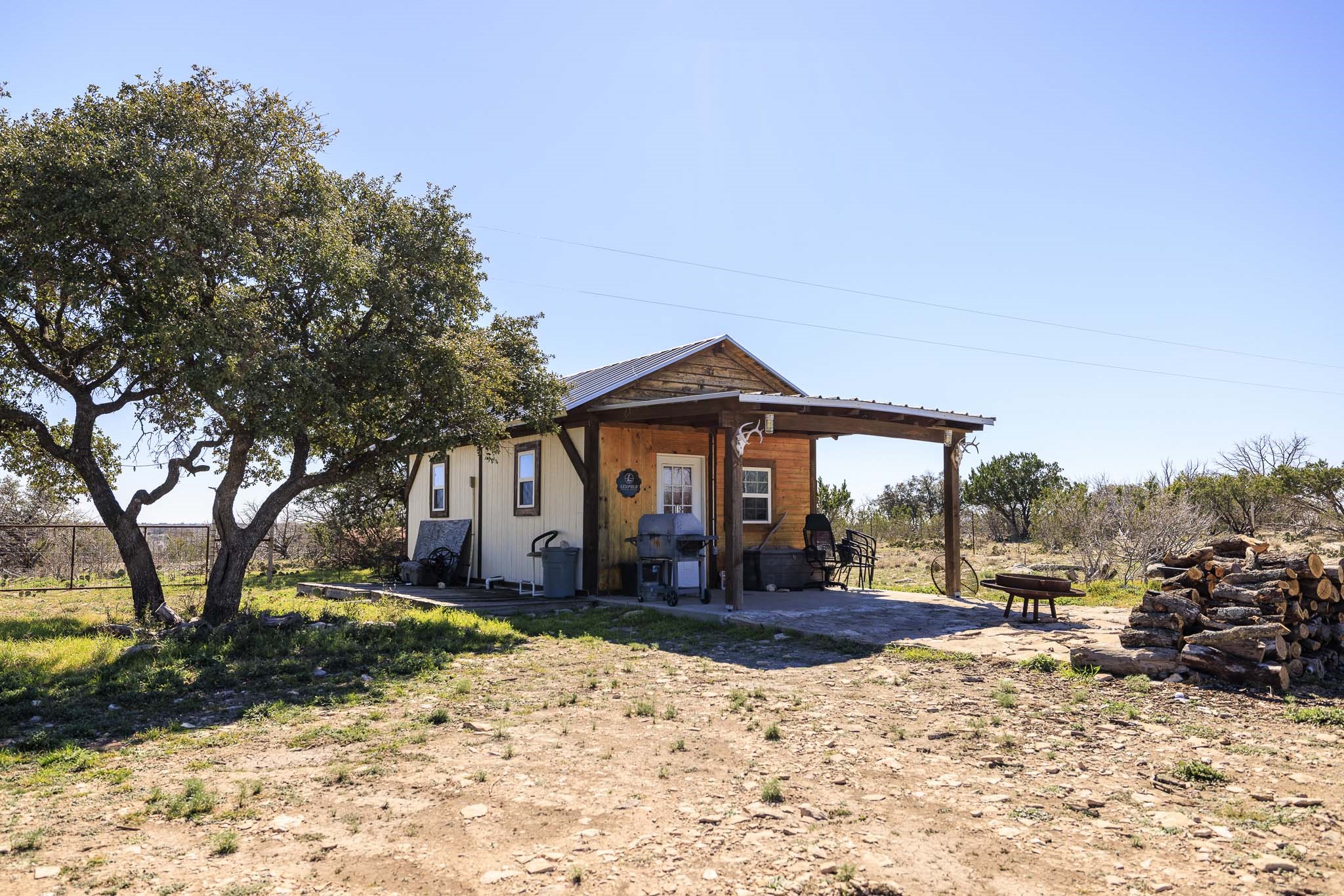 0 Deberry Lane Sonora, TX 76950 - Photo 44 of 50 a view of a house with a yard covered in snow