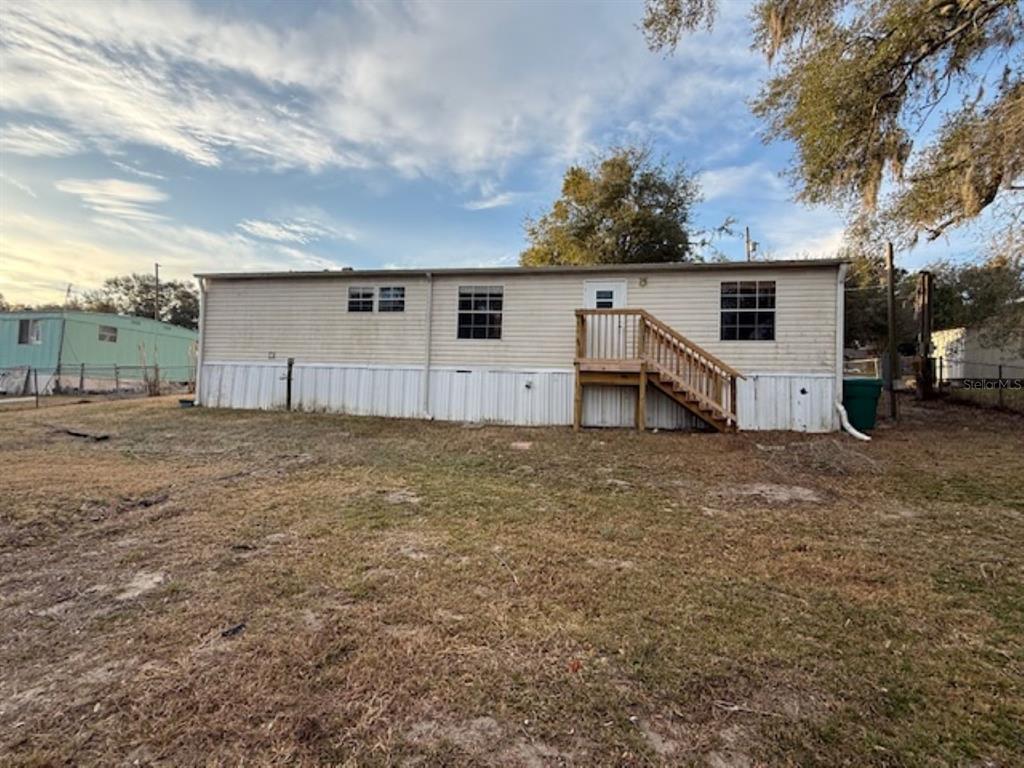217 Longview Avenue Lady Lake, FL 32159 - Photo 10 of 10 a view of a house with a yard