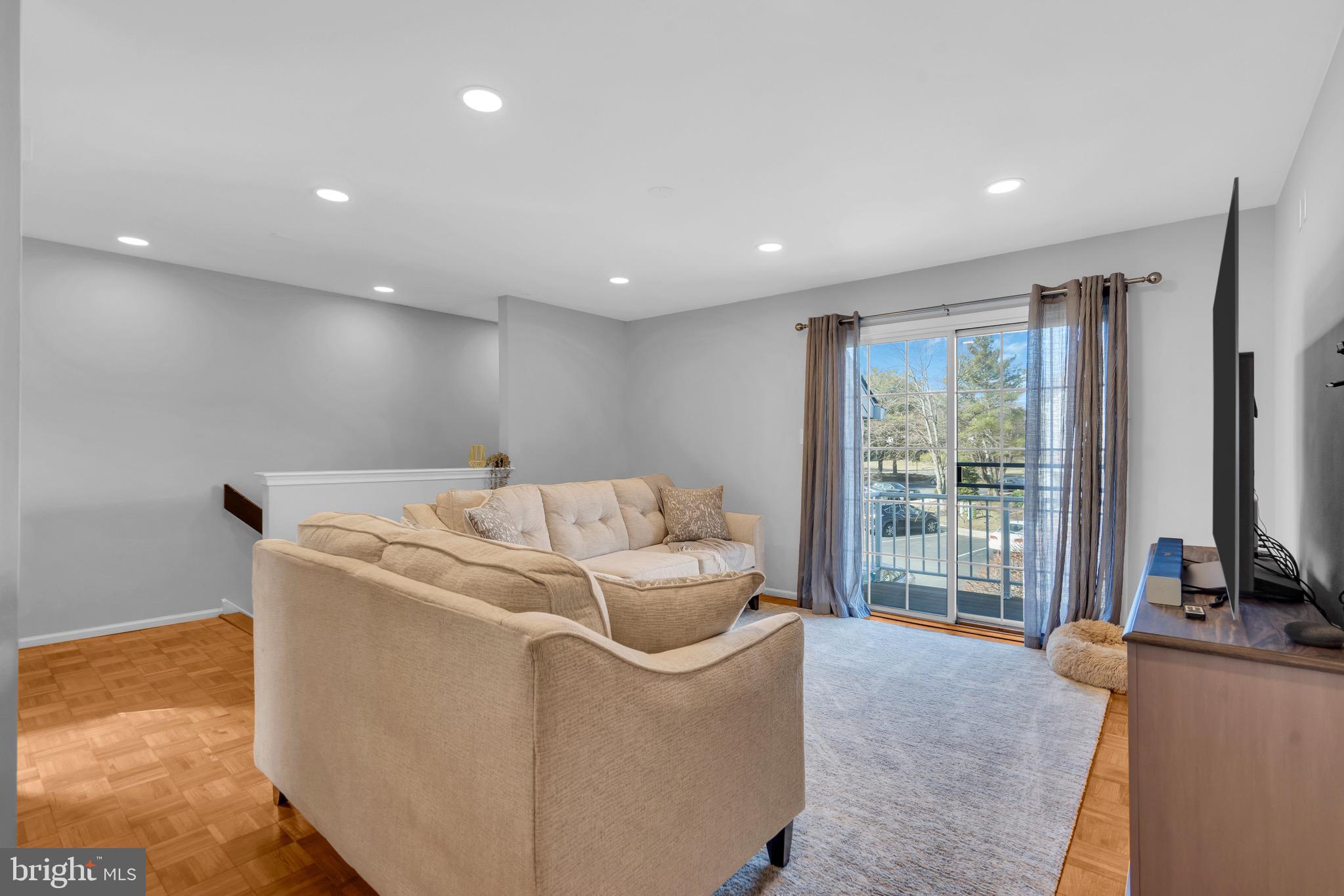 1508 B Ralston Drive Mount Laurel, NJ 08054 - Photo 10 of 29 a room with furniture and a flat screen tv