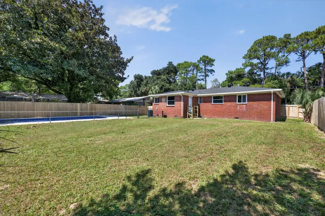 a view of outdoor space yard and front view of house