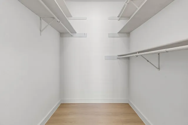 a view of an empty walk in closet
