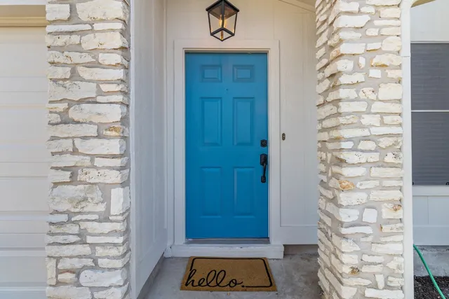 a view of entryway with a wooden door