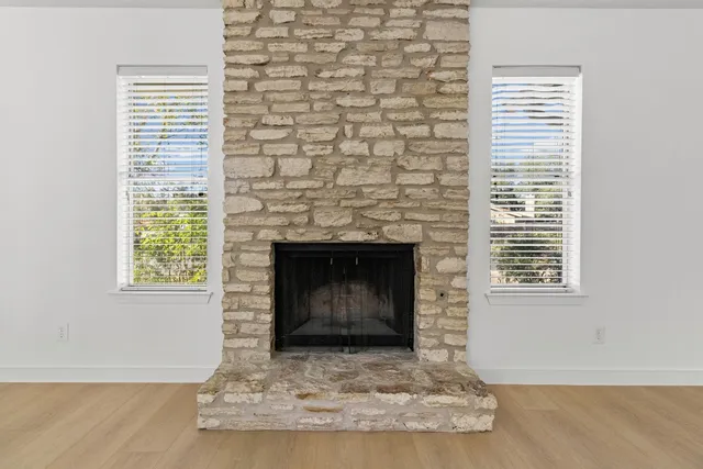 a view of fireplace and window