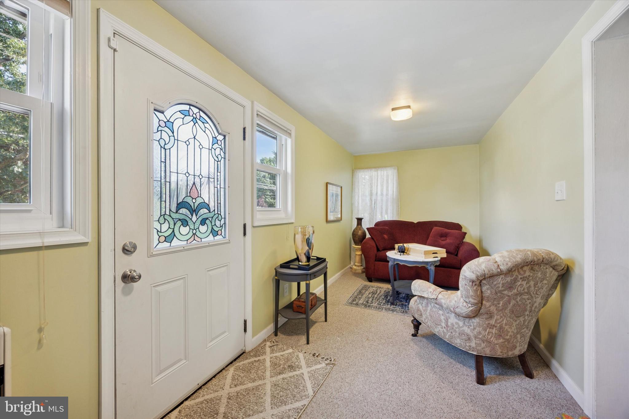 204 Media Line Road Newtown Square, PA 19073 - Photo 4 of 15 a living room with furniture and a window