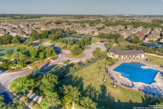 a view of a backyard with sitting area and furniture