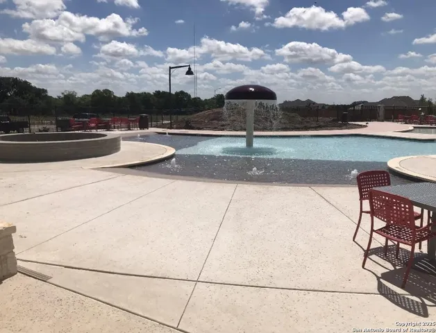 a view of house with patio