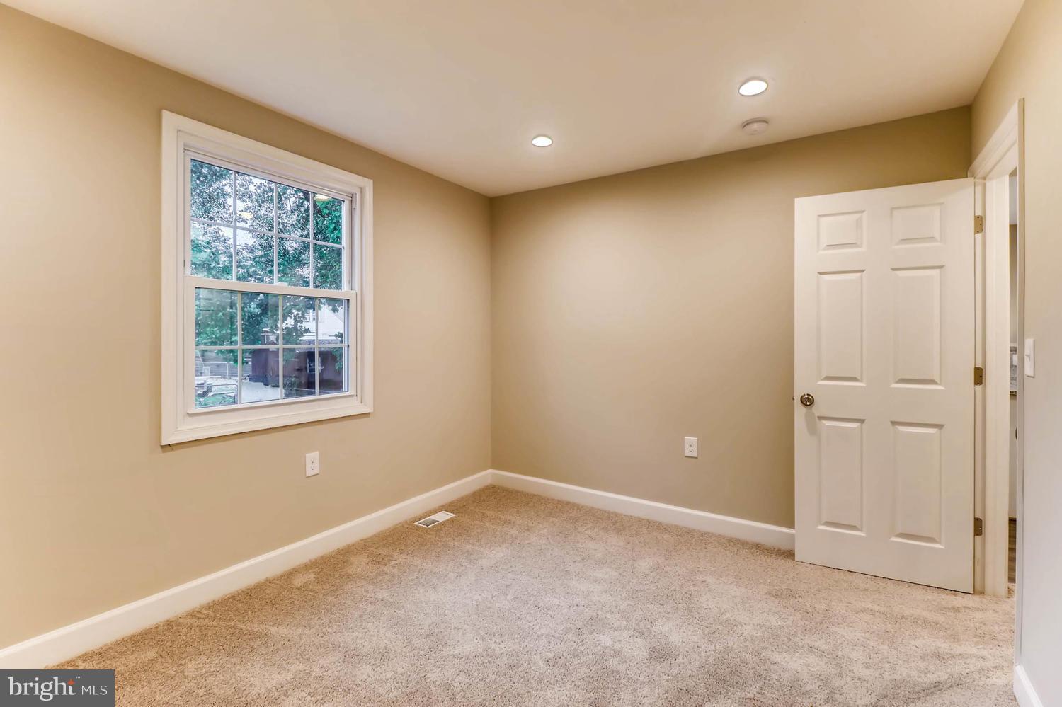 8103 Bullneck Road Baltimore, MD 21222 - Photo 13 of 26 a view of an empty room with a window