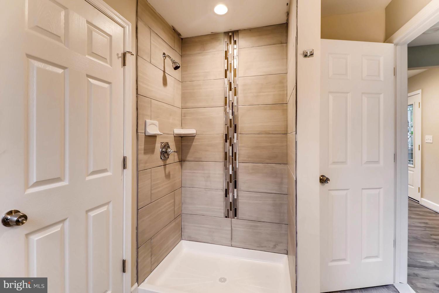 8103 Bullneck Road Baltimore, MD 21222 - Photo 15 of 26 a bathroom with a shower