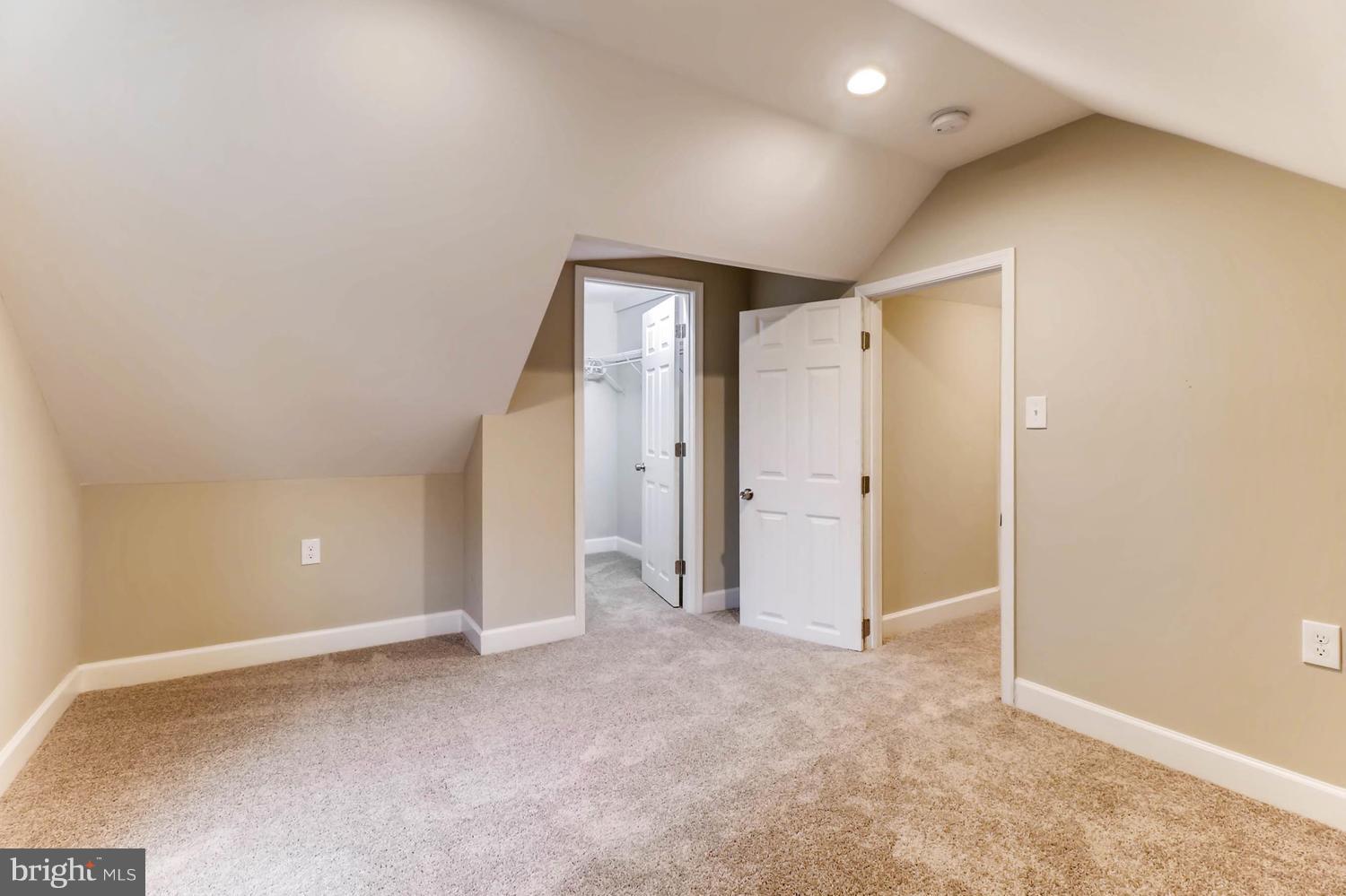 8103 Bullneck Road Baltimore, MD 21222 - Photo 17 of 26 an empty room with windows and closet