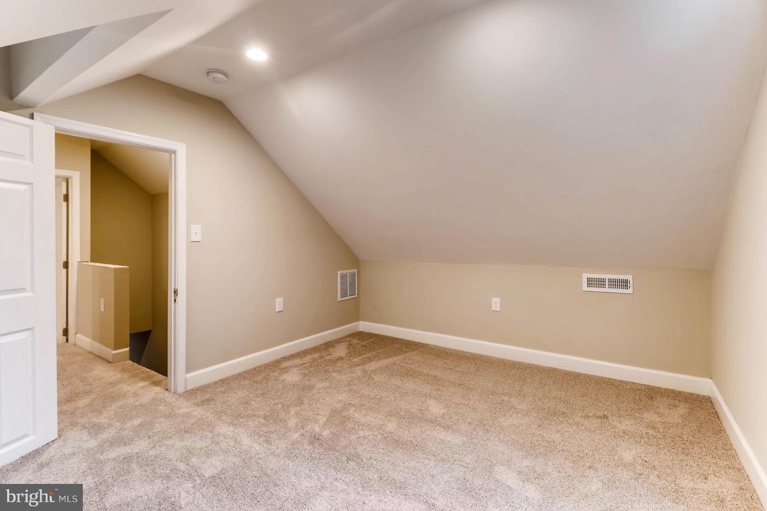 8103 Bullneck Road Baltimore, MD 21222 - Photo 18 of 26 an empty room with closet and windows