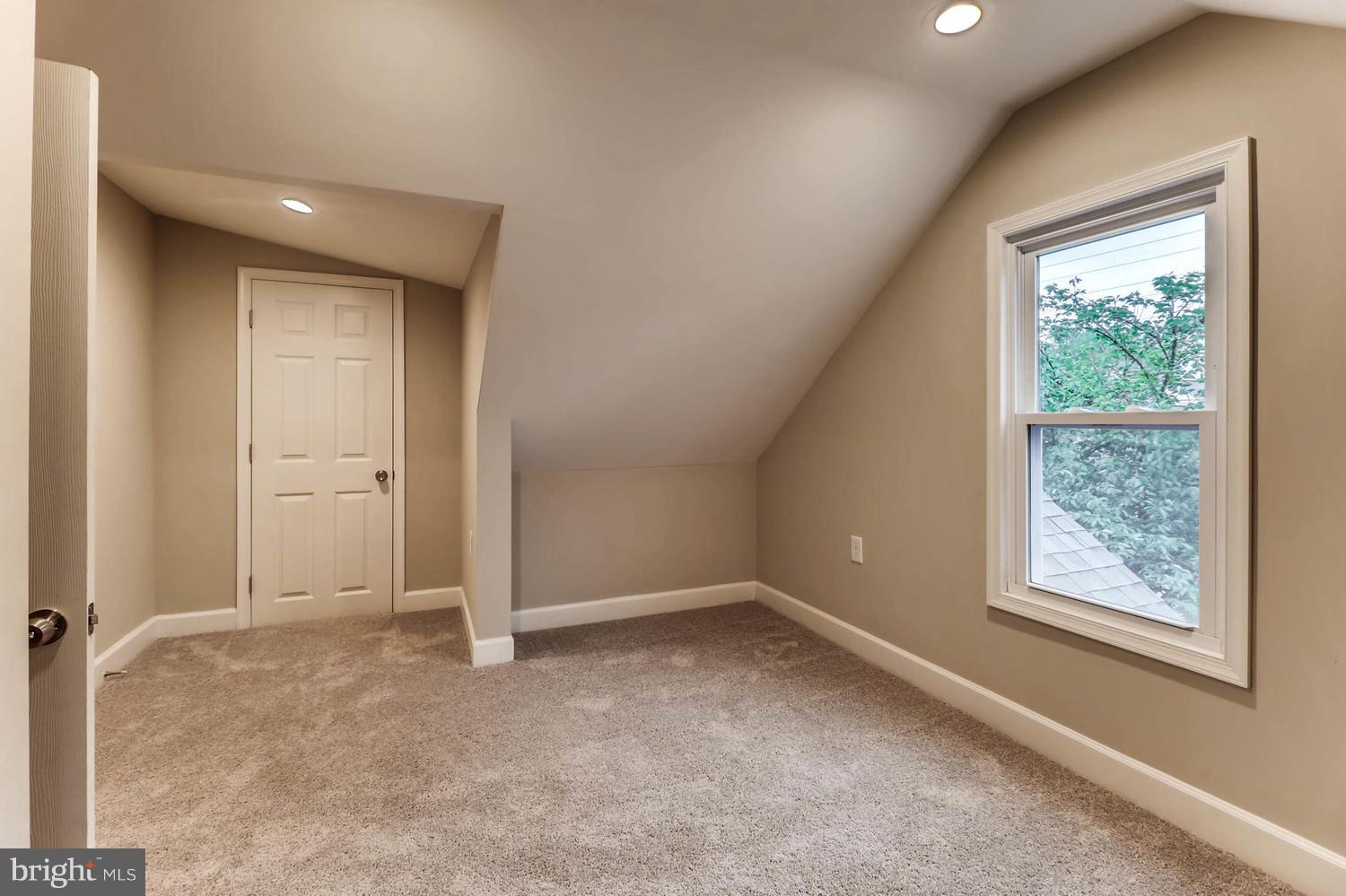 8103 Bullneck Road Baltimore, MD 21222 - Photo 24 of 26 an empty room with windows and closet