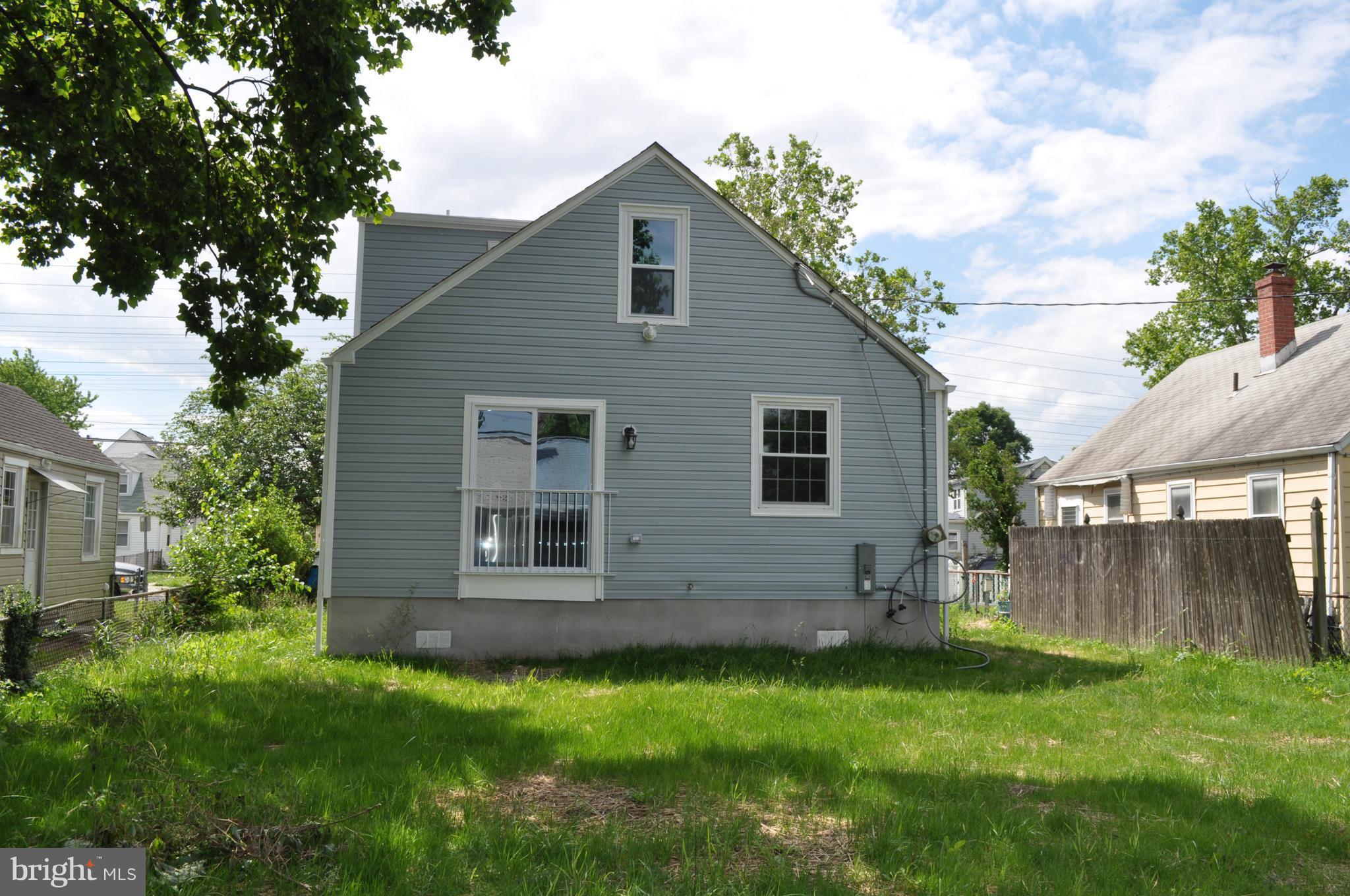 8103 Bullneck Road Baltimore, MD 21222 - Photo 26 of 26 a view of a house with a yard