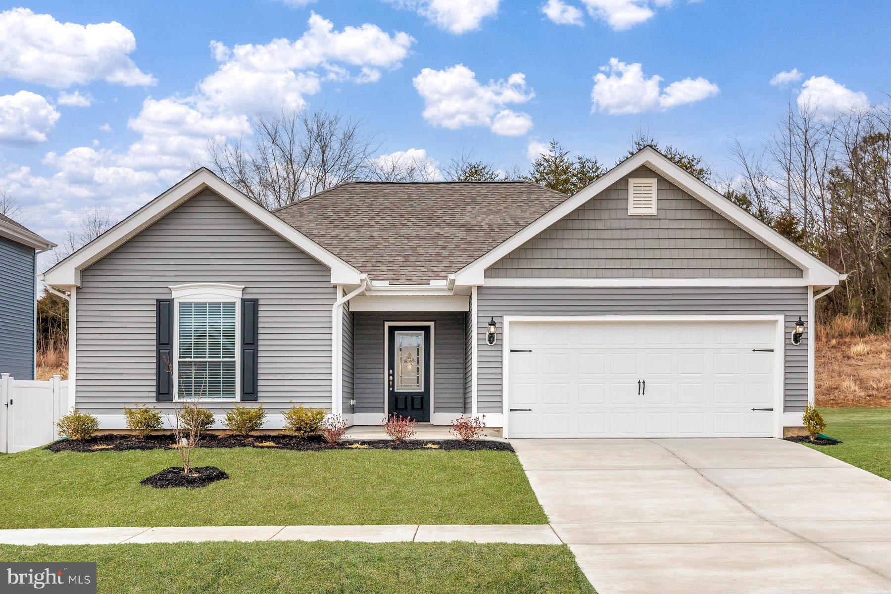 Stunning 1 story with a beautiful landscaped yard.