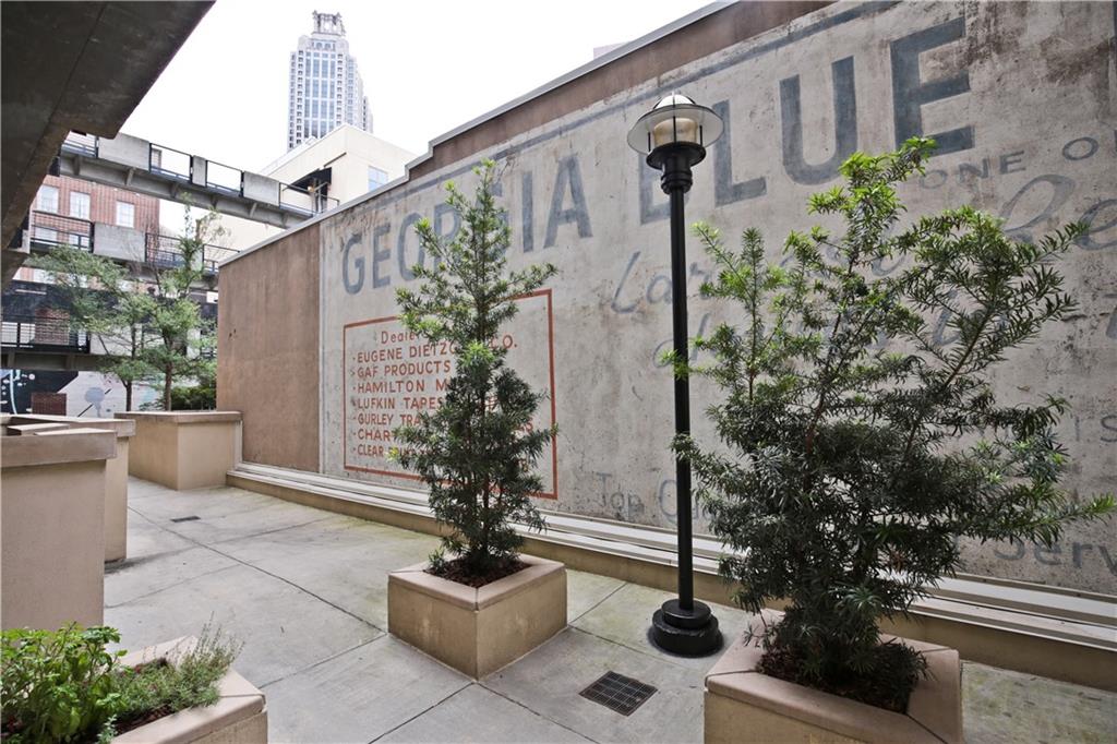 123 Luckie Street Northwest, Unit 2510 Atlanta, GA 30303 - Photo 25 of 28 a view of a patio with plants and potted plants