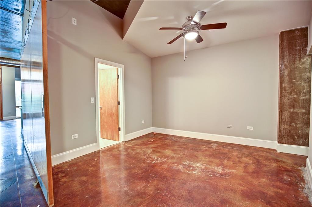 123 Luckie Street Northwest, Unit 2510 Atlanta, GA 30303 - Photo 6 of 28 wooden floor in an empty room with a window