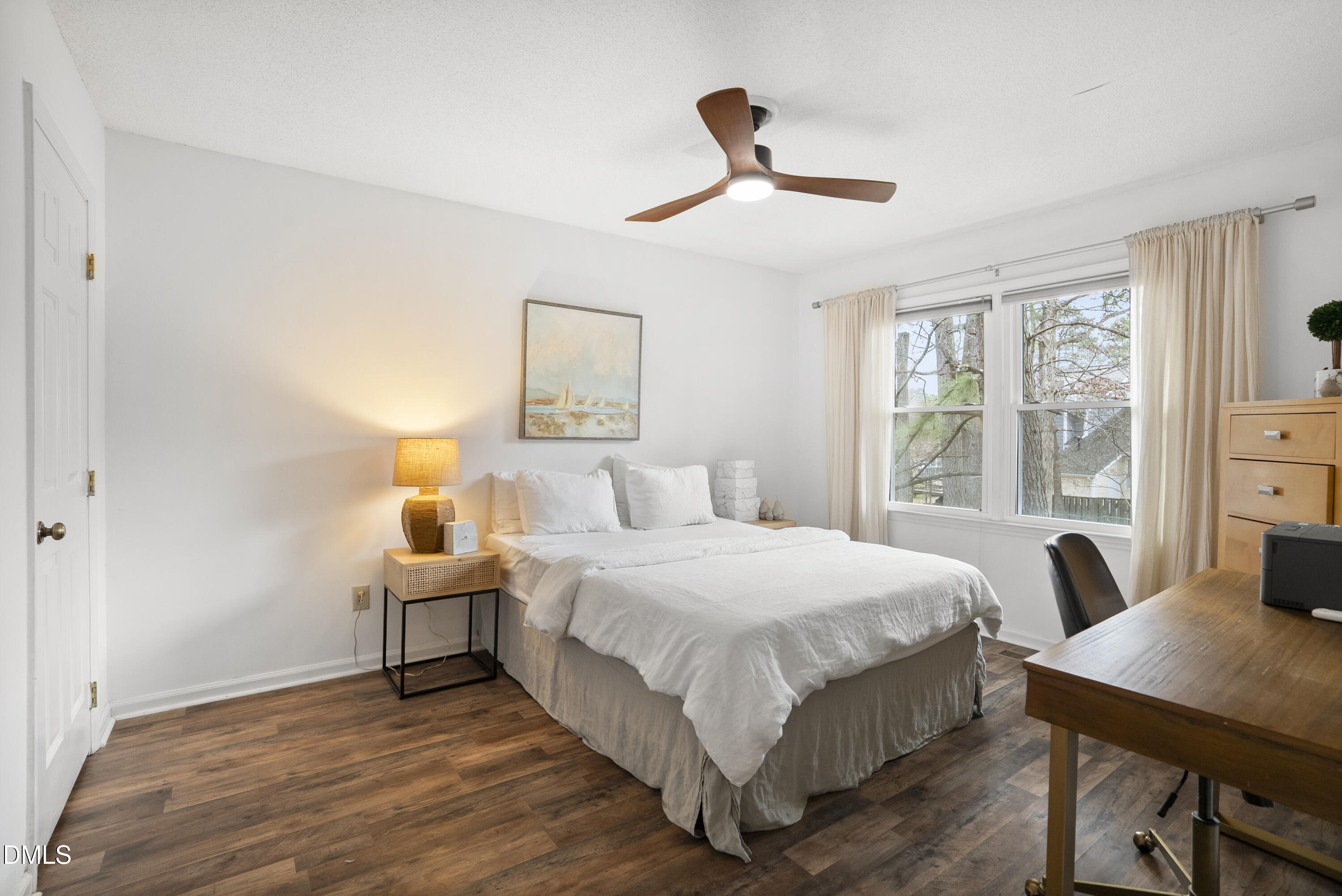 1515 Hemphill Drive Raleigh, NC 27609 - Photo 22 of 46 a bedroom with a bed and a table